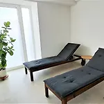 Prora - Familienfreundliche Ferienwohnung mit Balkon, Meerblick, Gemeinschaftssauna und Elektrogrill - Have a nice Day Apartment